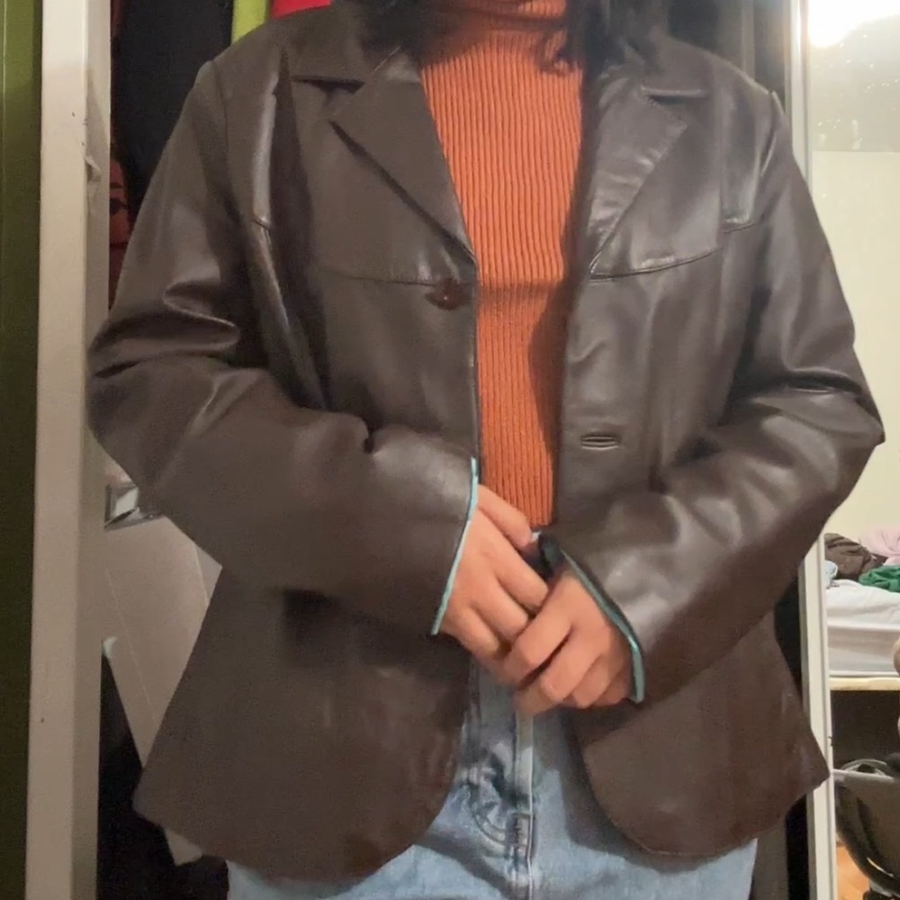 Brown Wilson’s leather jacket in perfect condition.
